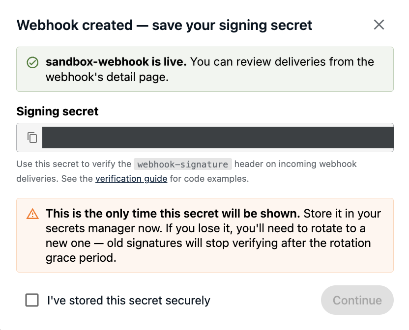 Signing secret dialog shown once after webhook creation